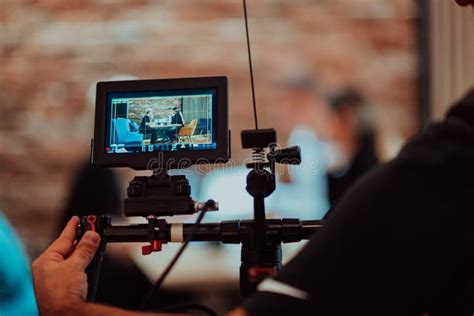 Behinde the Scenes. a Cameraman Records a Business Meeting that is ...