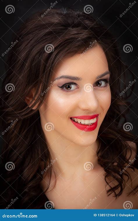 Portrait Of A Beautiful Brunette On A Dark Background Stock Photo Image Of Glamour Adult