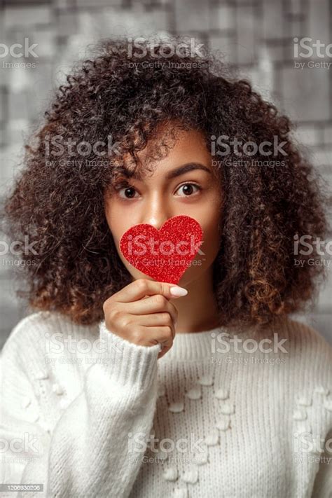 Closeup Portrait Of A Young Curlyhaired African American Girl In A