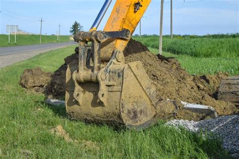 Backhoe Bucket Stock Photos Images And Backgrounds For Free Download