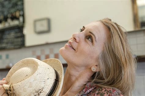 Premium Photo Mature Woman Looking Away At Home