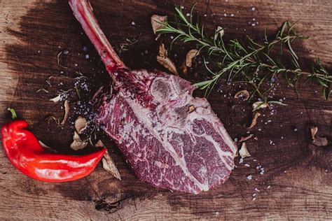 Premium Photo Raw Tomahawk Steak