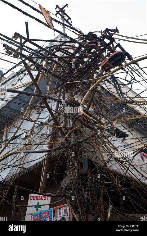 Overcharged Electric Pole New Delhi India Stock Photo Alamy