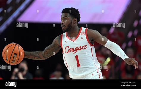 Houston Guard Jamal Shead Dribbles The Ball Up The Court Against