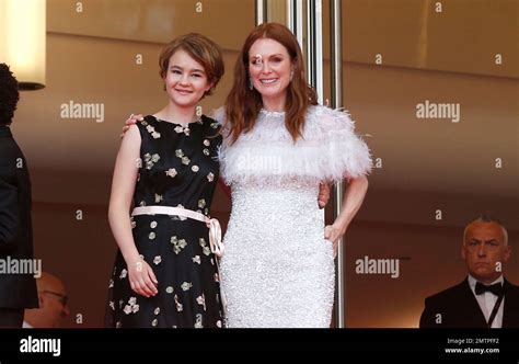 Actresses Millicent Simmonds Left And Julianne Moore Pose For