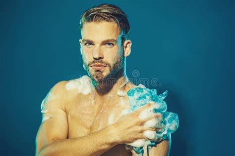 Attractive Man Taking Shower With Soapy Sponge Handsome Unshaven Macho With Naked Torso Washing