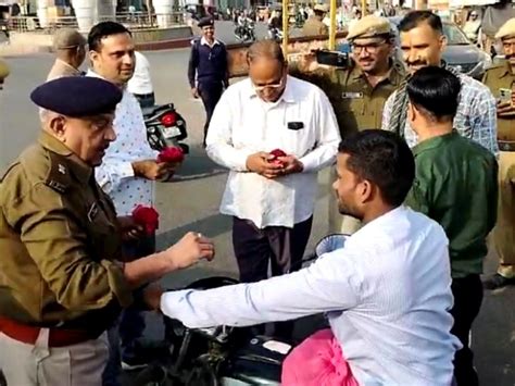 Those Not Wearing Helmets Got Roses Instead Of Challan हेलमेट नहीं