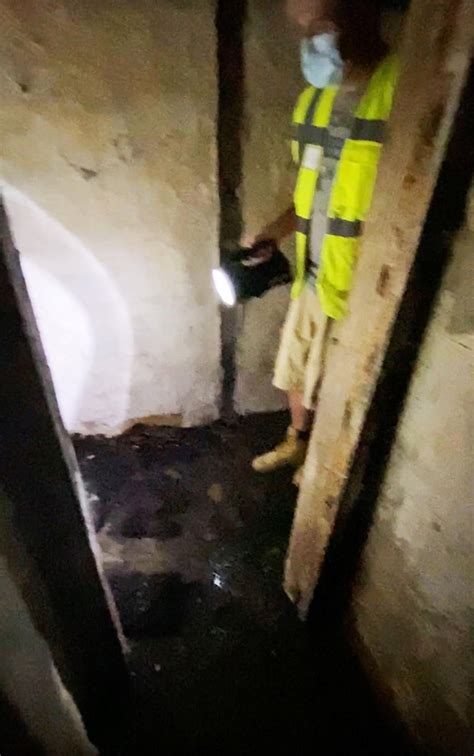 Couple discover 'freaky' hidden room behind bathroom wall