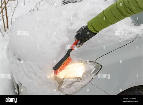 Man Removing Snow From Car Windshield Hi Res Stock Photography And