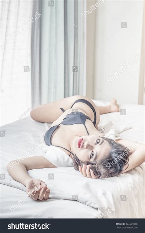 Sexy Asian Woman Black Bikini Lying写真素材324629048 Shutterstock