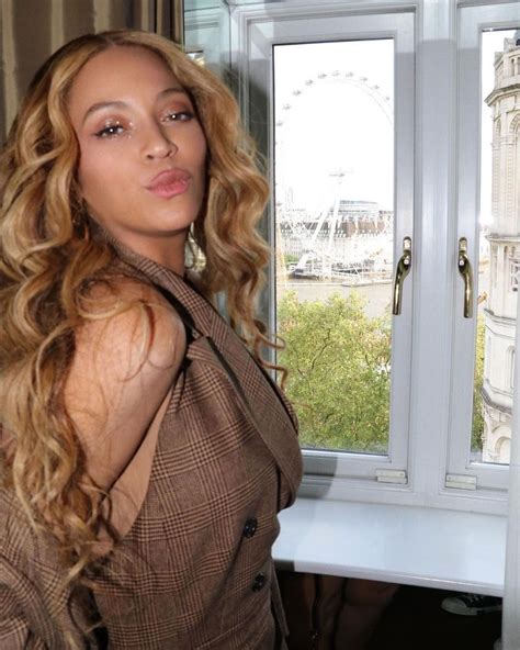 Beyoncé Takes On London in a Brown Plaid Michael Kors Suit with Nude Louboutin Pumps Fashion