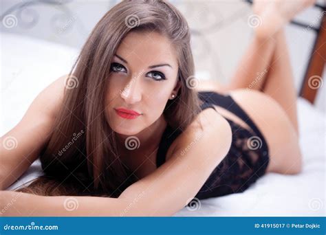Woman In Black Lingerie Lying On A Bed Stock Image Image Of Portrait Seductive 41915017