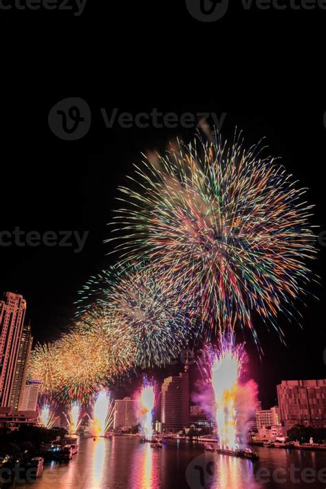 fireworks on the river at night 16705122 Stock Photo at Vecteezy