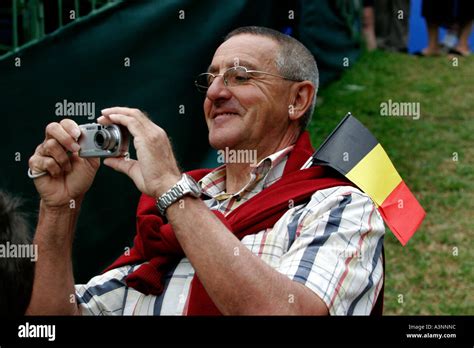 A Belgian Amateur Photographer With Digital Camera Photographs His Tennis Hero Stock Photo Alamy