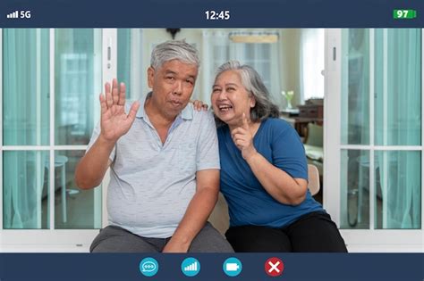 Premium Photo Application Screenshot View Of Happy Mature Grandparents Sitting At Home Having