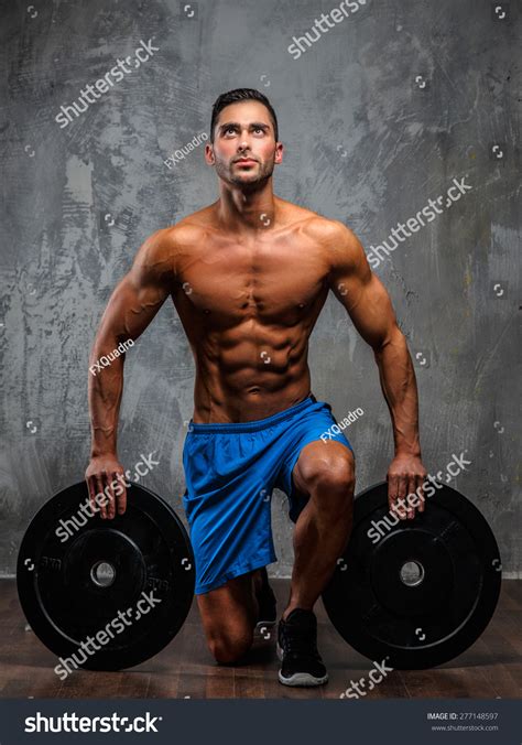 Muscular Man Naked Torso Holding Weights Stock Photo Shutterstock
