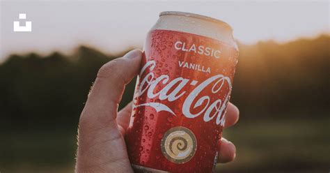 Person Holding Coca Cola Can Photo Free Drink Image On Unsplash