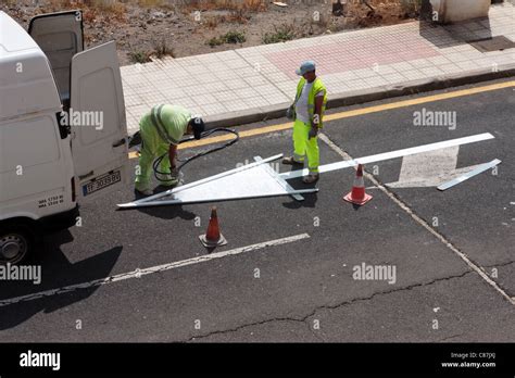Repainting Faded Road Markings Stock Photo Alamy