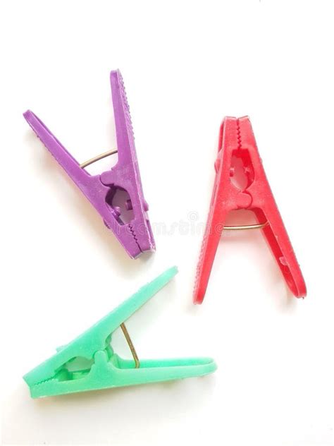 Three colored pins stock image. Image of white, clothespins - 71531097