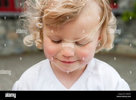Blonde Girl With Daisy Hair Portrait Stock Photo Alamy