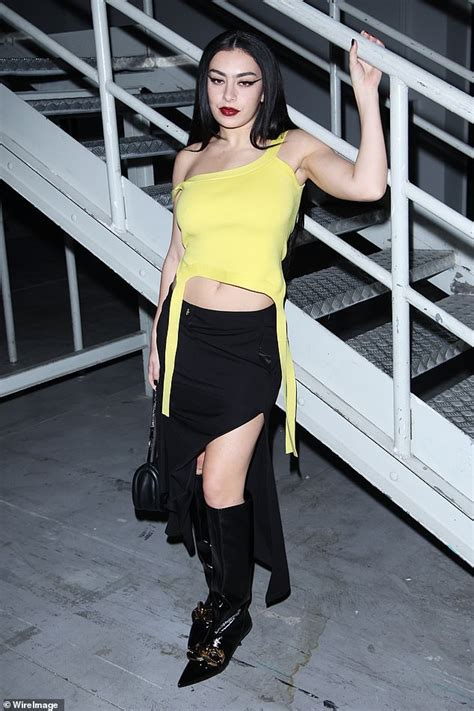 Charli Xcx Shows Off Her Toned Abs In A Yellow Crop Top And Thigh