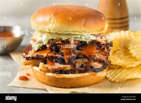 Homemade Chopped Brisket Sandwich With Bbq Sauce And Chips Stock Photo