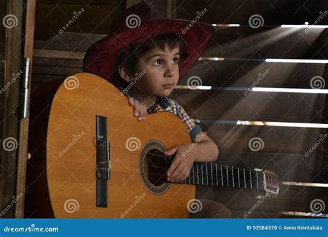 Little Boy In Cowboy Hat With Guitar Stock Photo Image Of Musician