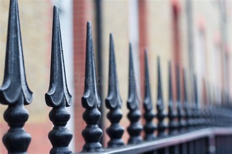 Close Up of Black Painted Iron Fence Spikes Stock Image - Image of ...