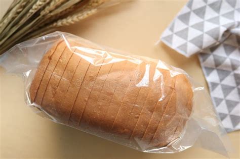 Top View Of Bread In A Plastic Packet On Table Stock Photo Image Of