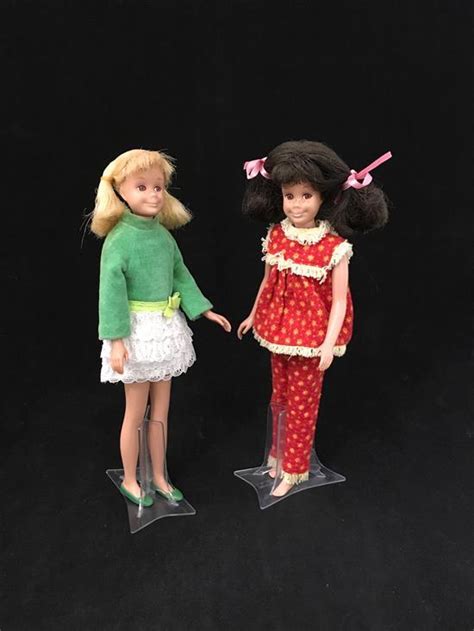 Lot 2 SKOOTER DOLLS INCLUDING BRUNETTE AND BLONDE BRUNETTE WEARS WOOLY P J S BLONDE