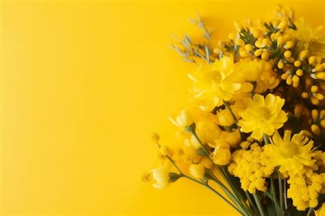 Premium AI Image A Bouquet Of Flowers On A Yellow Background