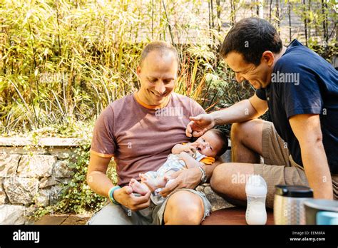 Gay Couple Baby Bottle Hi Res Stock Photography And Images Alamy