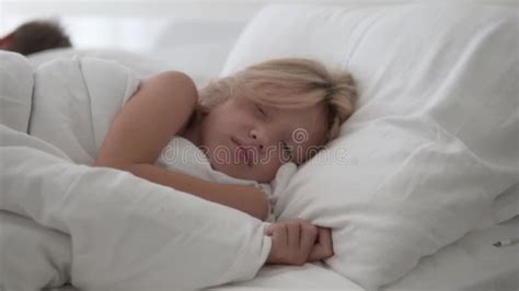 Beautiful Blonde Girl Wakes Up In The Morning In Bed At The Hotel Stock Video Video Of