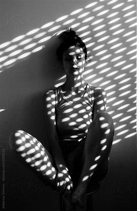 Portrait Of Beautiful Woman With Light On Her Skin By Katarina Simovic