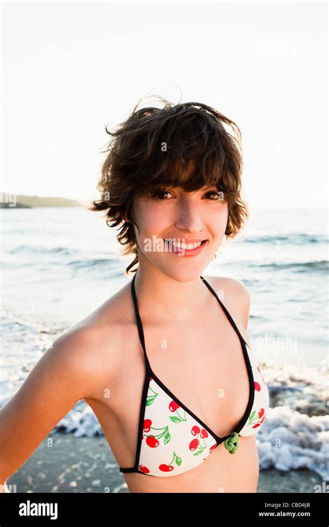 Woman Smiling In Bikini On Beach Stock Photo Alamy