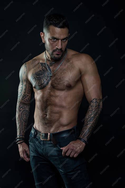 Premium Photo Sport Or Fitness And Bodycare Bearded Man With Fit Tattooed Body Man With Sexy