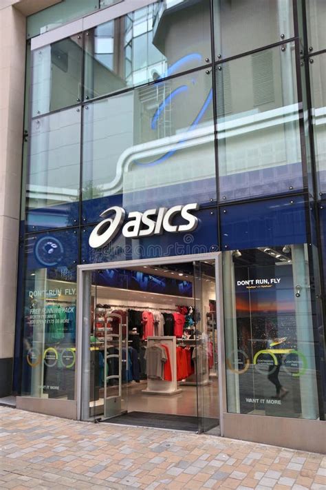 Asics sports shop editorial stock image. Image of wear - 80562789