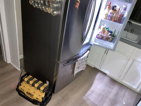 Power outage until morning, but that fridge is still rolling. | Scrolller