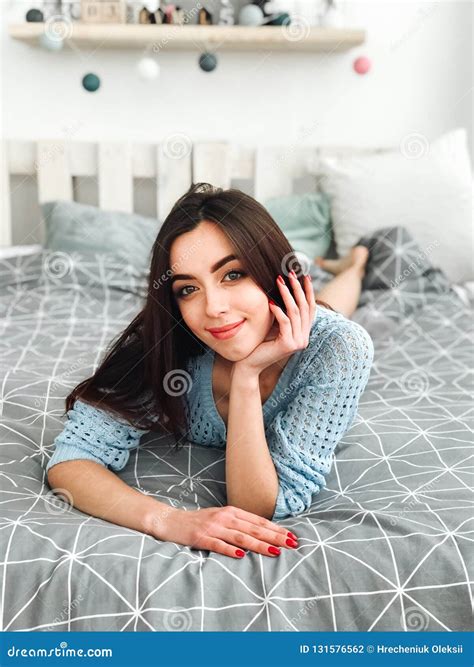 Attractive Brunette Girl In Lingerie Lying On Bed Stock Photo Image Of Charming Person