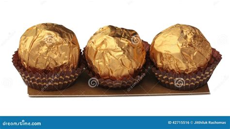 Sweet Chocolate Candy Wrapped in Golden Foil Stock Photo - Image of ...