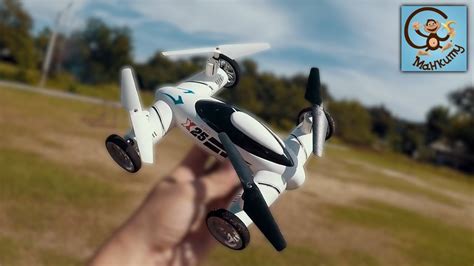 Про машинку вертолёт. Игрушка квадрокоптер с колёсами. МанкиТайм - YouTube