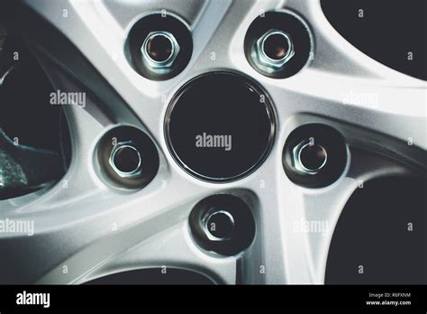 Modern automotive wheel on light alloy disc Stock Photo - Alamy