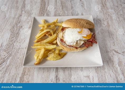 Classic Beef Burger With Fried Egg Lots Of Bacon And Melted Cheese Stock Image Image Of