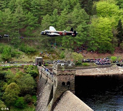 Lancaster bomber flypast marks 70 years since the Dambusters