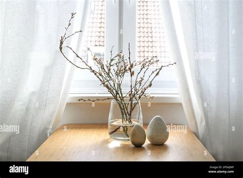Pussy Willow Catkins And Flowering Branches In A Glass Vase And