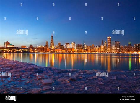 Chicago Skyline At Twilight In Winter With A Reflection As Seen From