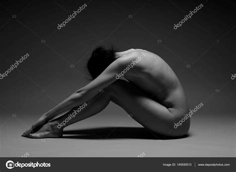 Beautiful Nude Woman Practicing Yoga Stock Photo By Zhagunov