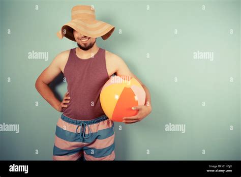 Man Beach Ball Hi Res Stock Photography And Images Alamy