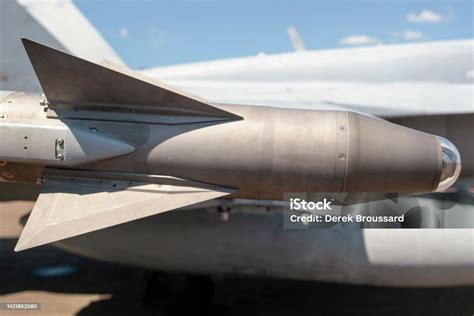 A Missile Head On The Wing Of A Fighter Jet Stock Photo Download