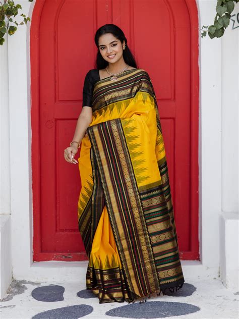Reddish Pink Kanjeevaram Silk Saree With Dark Green Border